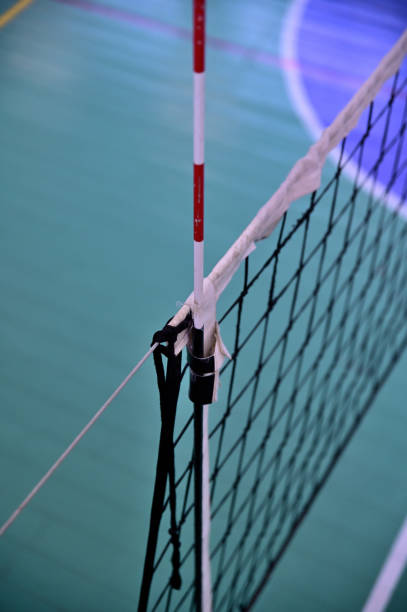 istock Attaching the antenna to the volleyball net. 1340510608