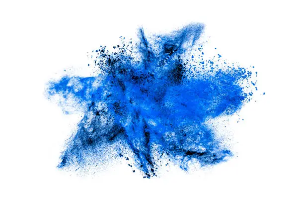 Abstract exploding blue powder isolated on white background.