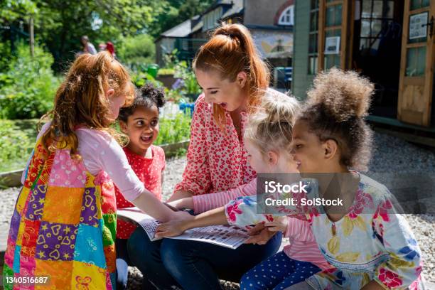 We Love This Story Stock Photo - Download Image Now - Child, Education, Teacher
