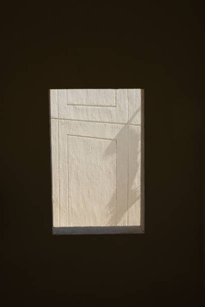 istock Selective focus on light wall in dark window.Conceptual image of light in window. 1340516856
