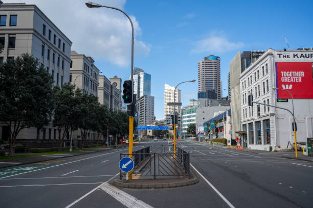 Rush hour in down town Auckland City at the corner of Queen street and Custom street, Auckland, New Zealand.