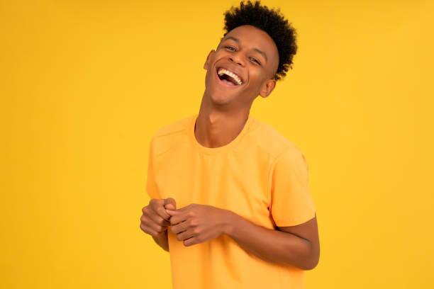 istock Portrait of a young afro man smiling. 1340519521