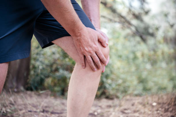 istock A man massaging his kneecap while suffering from patellofemoral joint pain 1340519850