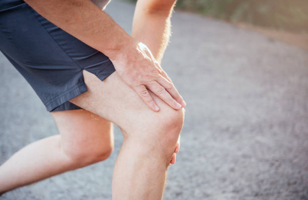 istock A man massaging his kneecap while suffering from patellofemoral joint pain 1340520095