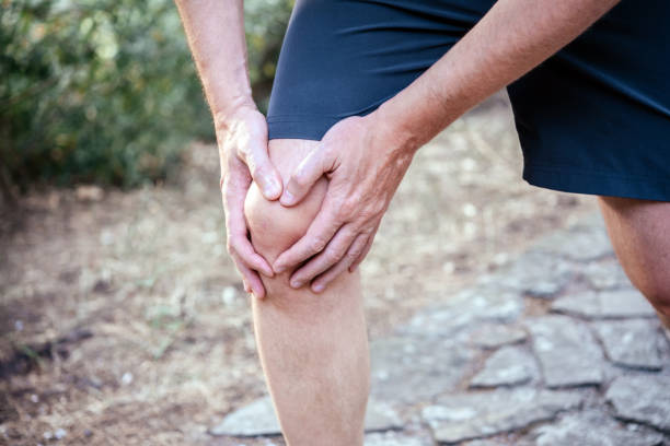 istock Man having knee pain while exercising, knee trauma treatment 1340520972