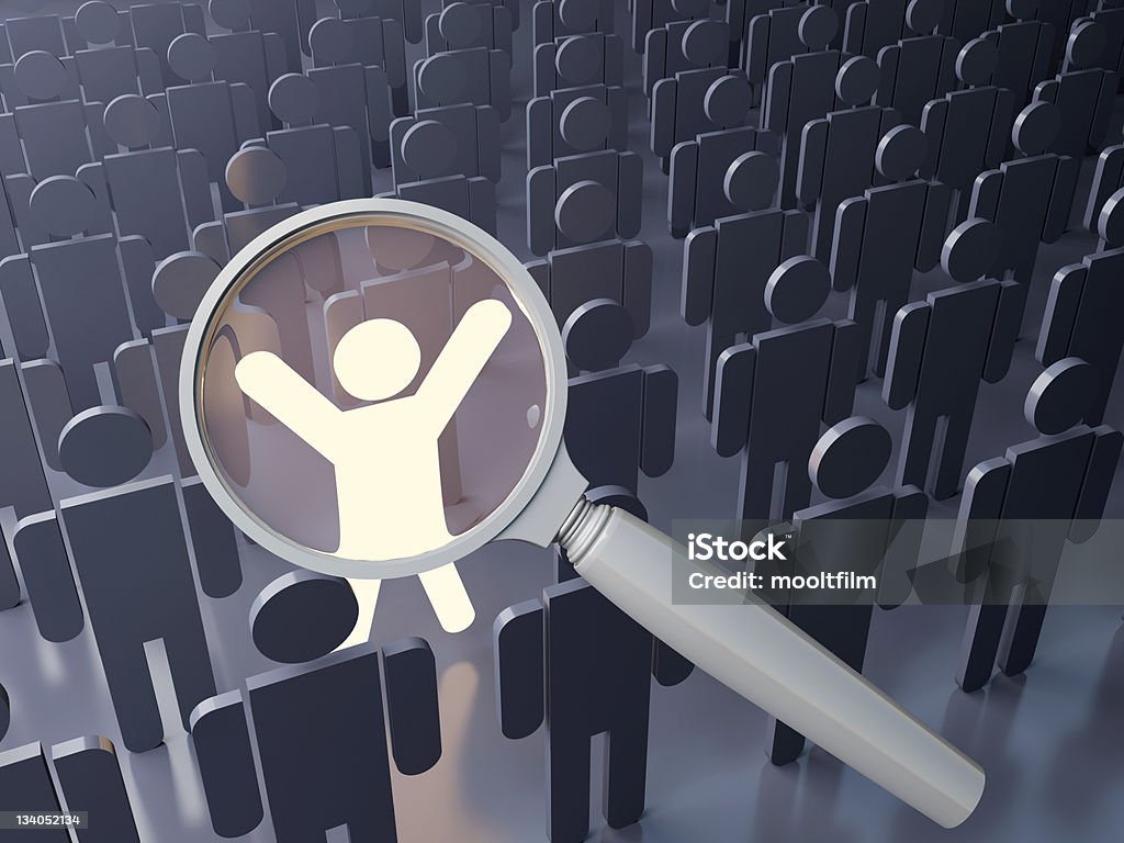 Outstanding people search Searching concept. Outstanding  person in the crowd. Big magnifying glass over the bright figure among grey human figures Skill Stock Photo