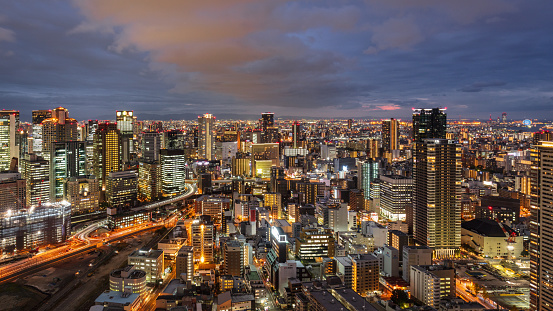 Osaka Japan Illuminated Downtown Cityscape Panorama at Sunset
