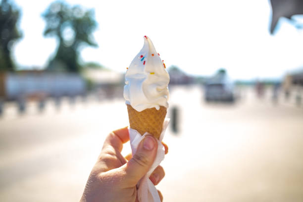 istock ice cream cone melts and flows in hand on a hot day outside 1340528216
