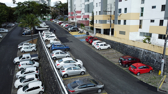 salvador, bahia, brazil - september 9, 2021: view of vehicles parked in a parking lot of a middle class condominium in the city of Salvador.