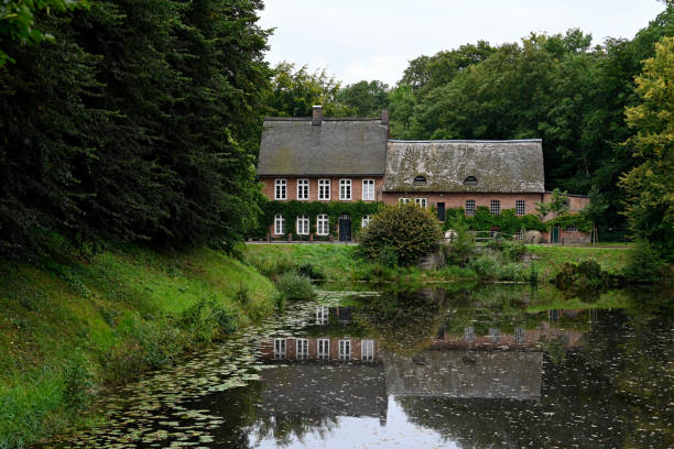 Ahrensburg, Germany, September 4, 2021 - The historic castle mill at Muehlenredder in Ahrensburg, Schleswig-Holstein