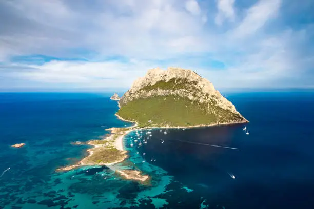 Photo of View from above, stunning aerial view of Tavolara Island, a limestone massif with beautiful beaches bathed by a turquoise water. Sardinia, Italy.