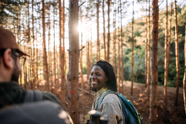istock Young couple enjoying beautiful forest 1340531395