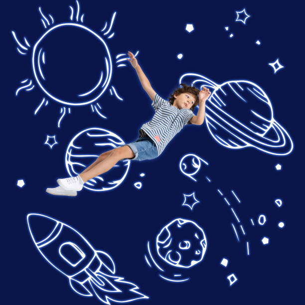 istock Conceptual artwork with little boy in huge white astronaut helmet flying in drawn outer space. Ideas, inspiration, imagination. Collage 1340531639