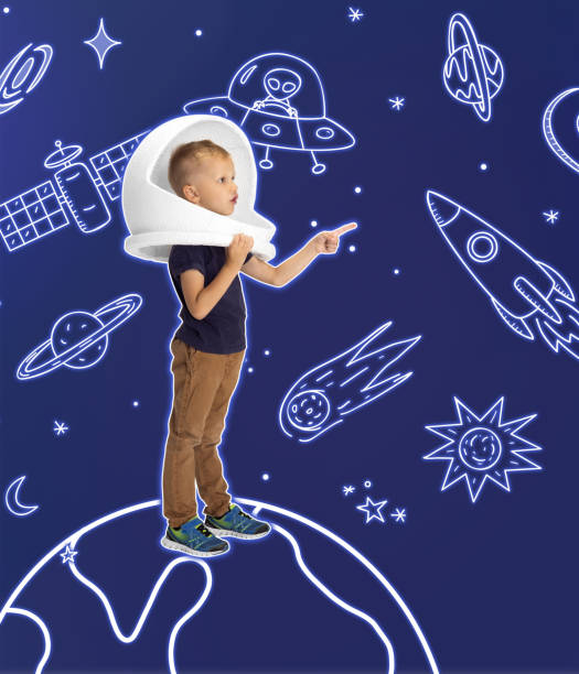 istock Creative artwork with little boy in huge white astronaut helmet standing among drawn planets, asteroids and stars in outer space. Ideas, inspiration, imagination. Collage 1340531655