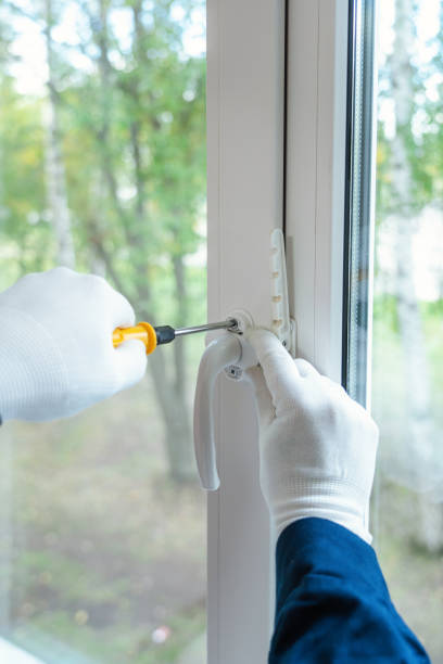 istock The wizard installs the handle on the plastic window. close-up, selective focus 1340531946