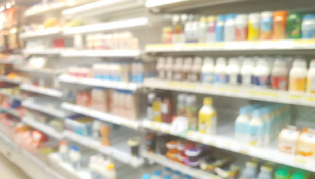 istock defocused convenient stores' refrigerator shelves displaying fruit juice, soft drink, milk, beverage products. abstract blur commercial background. multi brand of beverage on product shelves. 1340532097