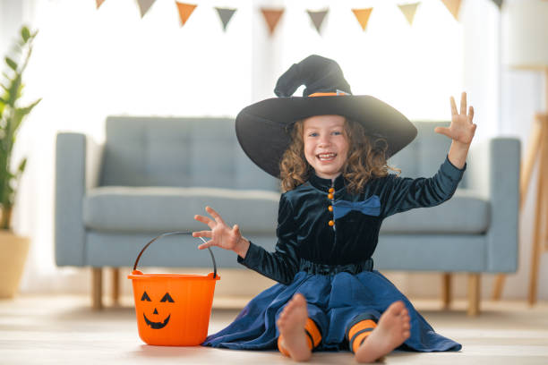 istock child with carving pumpkin 1340534780