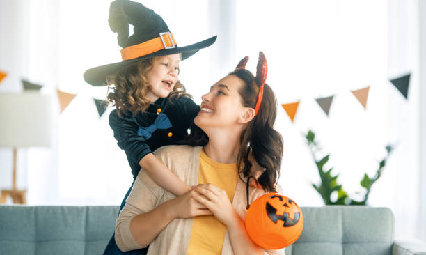 istock Happy family celebrating Halloween 1340534950