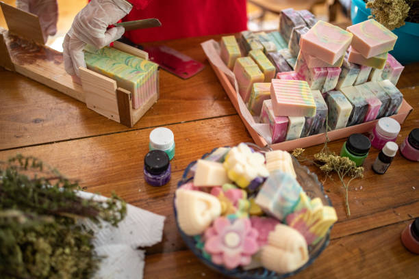istock Woman making organic soaps at home 1340542251