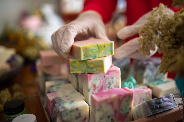 Woman making organic soaps at home