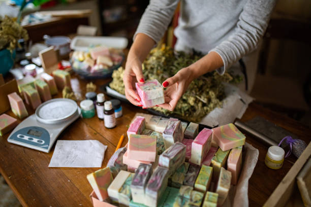Woman making organic soaps at home