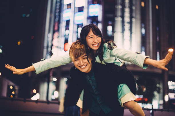 istock Man piggybacks girl 1340543384