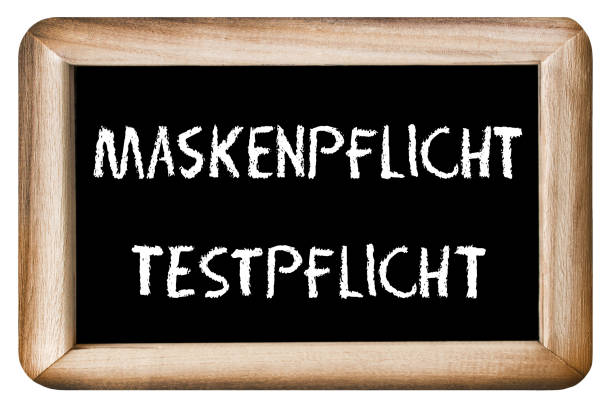 istock Mandatory face masks and test  on chalk board 1340545077