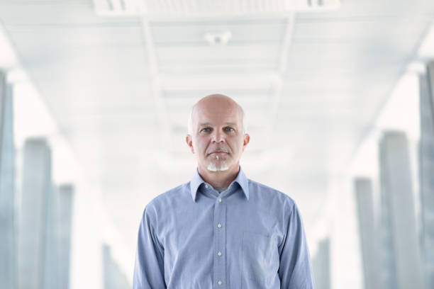 istock Senior businessman with a deadpan serious expression 1340545285