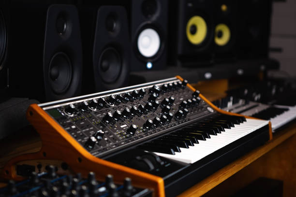 istock Analog synthesizer in dj store. Buy new professional synth device for electronic music production in musical shop. 1340548609