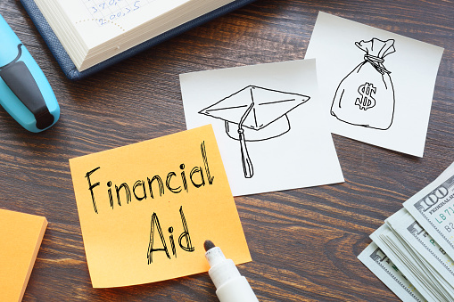 Financial aid is shown on a business photo using the text