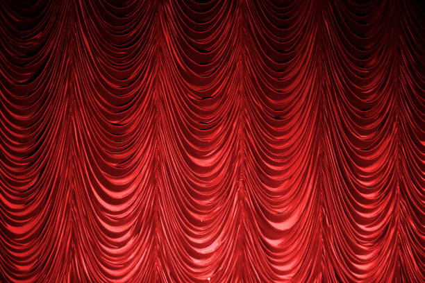 istock Stage classic burgundy curtains. Theatrical background. 1340555516