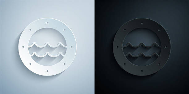 Paper cut Ship porthole with rivets and seascape outside icon isolated on grey and black background. Paper art style. Vector Paper cut Ship porthole with rivets and seascape outside icon isolated on grey and black background. Paper art style. Vector. immersed in their work stock illustrations