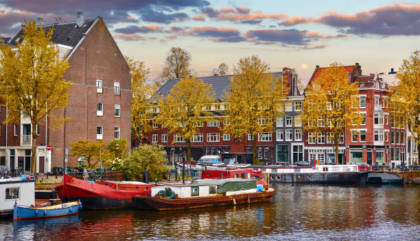 istock Bridge over channel in Amsterdam Netherlands houses river Amstel 1340556366