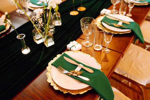 istock Beautiful decorated table for the event in the restaurant in emerald color. 1340560411
