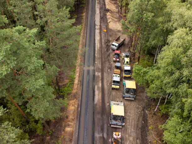 istock Building and repairing of asphalt roads using modern technology 1340560537