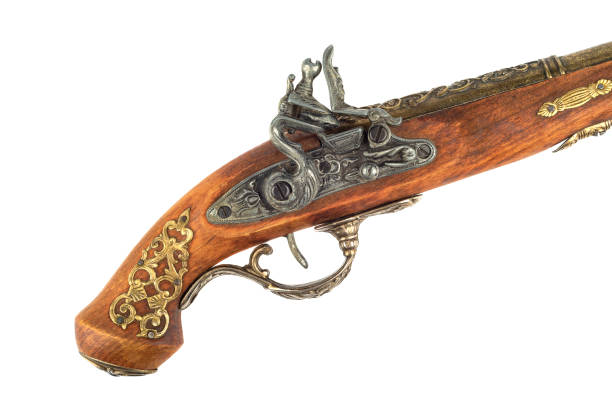 istock Antique pistol inlaid handle and trigger mechanism. 1340560995