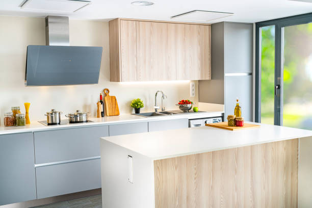istock Modern gray and white kitchen with island 1340560996