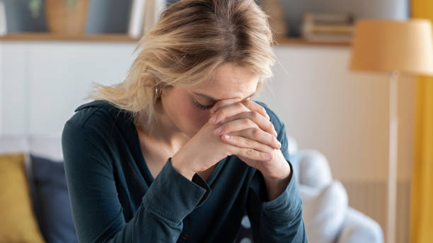 istock Young woman feeling depressed and stressed 1340561099