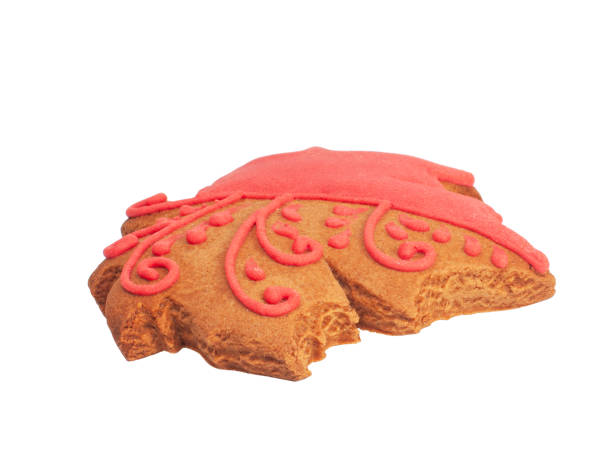 istock Tasty gingerbread cookie maple leaf isolated on the white 1340561356