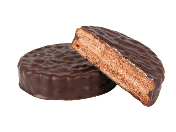 istock Chocolate sandwich cookies isolated on the white 1340563375