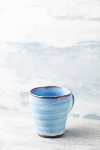 istock Traditional, handcrafted ceramic on bright wooden background. Soft focus. Copy space. 1340563659