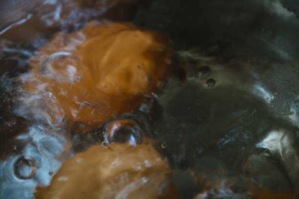 istock Out of focus. Blurred background. Eggs are boiled in boiling water. 1340564385