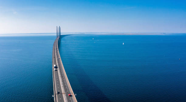 panoramic view of oresund bridge during sunset over the baltic sea - suspension railway imagens e fotografias de stock