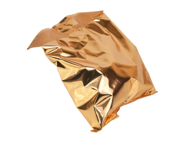 istock Golden foil package bag isolated on the white background 1340575007