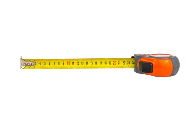 istock Tape measuring building tool isolated on the white background 1340575161