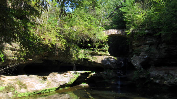 istock Waterfall and Bridge in Hocking Hills State Park 1340575464