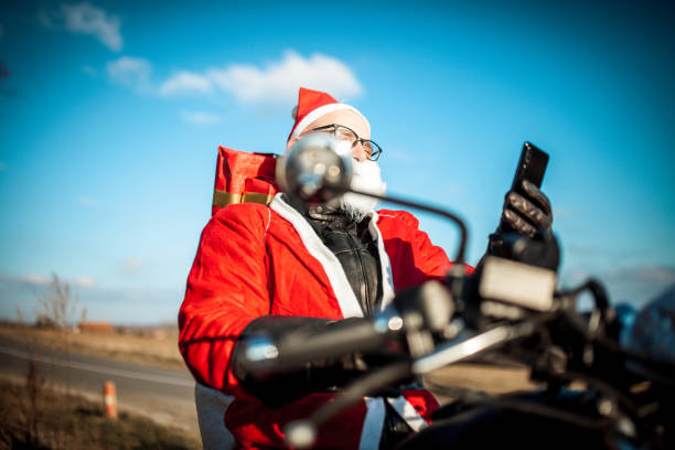 istock Santa Claus on Motorcycle 1340578016