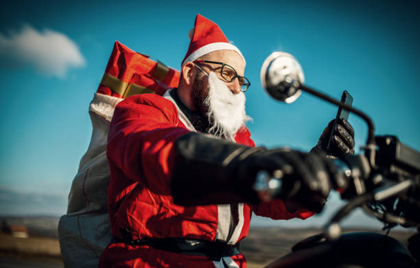 istock Santa Claus on Motorcycle 1340578091