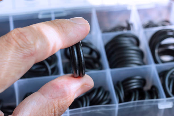 Gaskets used in hydraulics, pneumatics and connections of parts of mechanisms. A set of rubber O-rings. Gaskets used in hydraulics, pneumatics and connections of parts of mechanisms. gasket stock pictures, royalty-free photos & images