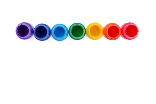istock Jars with rainbow colors isolated on white background. Top view. 1340582196